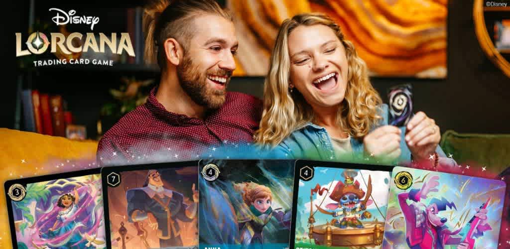 A happy man and woman enjoying a Disney Lorcana trading card game with colorful cards spread out in front of them.