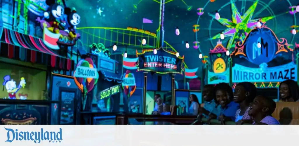 Visitors enjoying the Runway Railway of Mickey & Minnie.