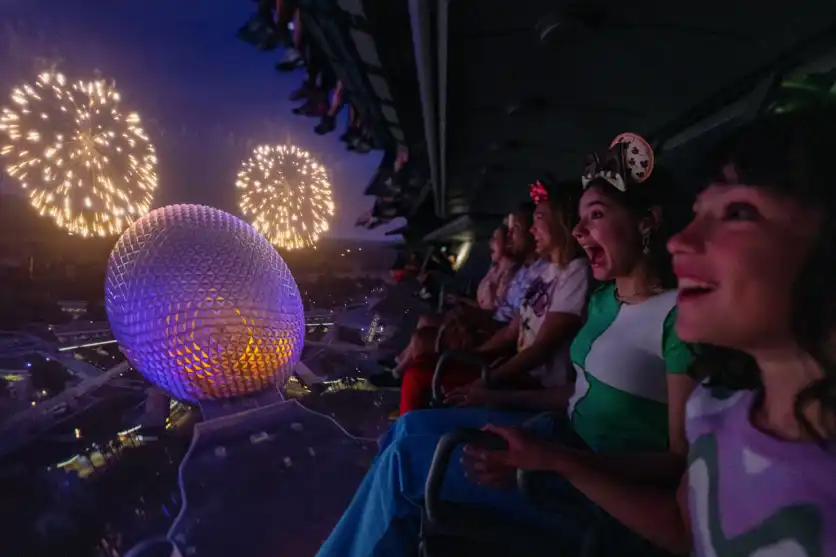 Image of a Magic Kingdom card featuring iconic Disney elements, vibrant colors, and a whimsical design.