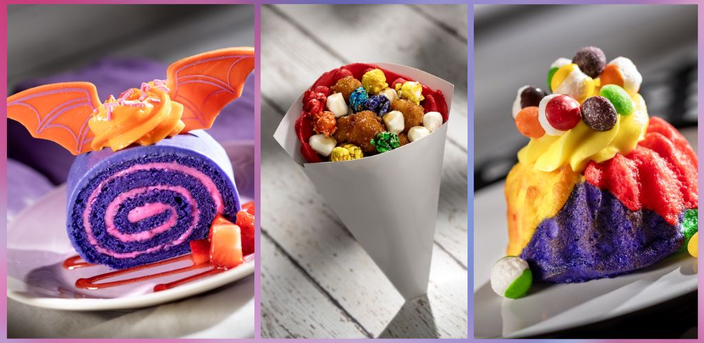 Image of colorful rolled cake with orange bat decorations, cone filled with rainbow candies and popcorn, and a cupcake topped with assorted candies and purple frosting.